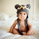 bébé avec un chapeau hibou